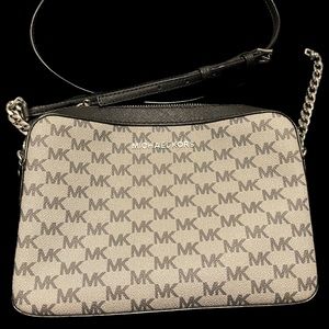 Black and grey Micheal Kors handbag